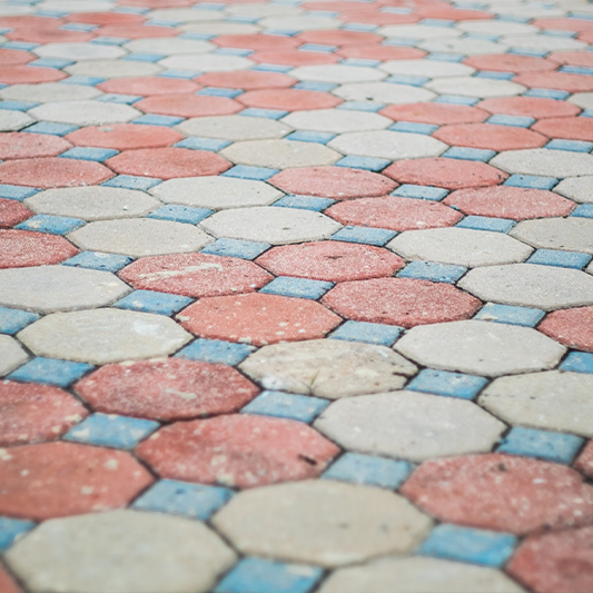 Designer paving tiles for outdoor spaces